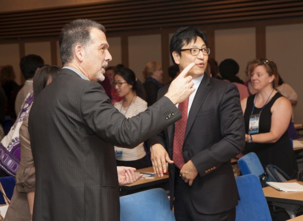 discussing with Dr.Charles Browne nc2014 by Jeroen Root for KOTESOL
